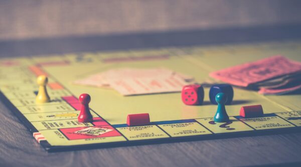 Custom board game printing solutions at ABPro Print, displaying tactical maps and accessory kits for multiplayer engagement
