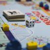 Intricate custom board game printing via ABPro Print, presenting layered components and narrative boards for collaborative adventures