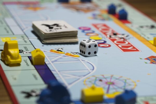 Intricate custom board game printing via ABPro Print, presenting layered components and narrative boards for collaborative adventures