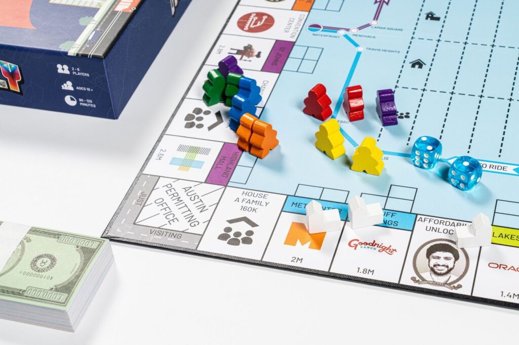 Custom Board Game Manufacturing process showcasing vibrant game boards and cards for designers and wholesalers